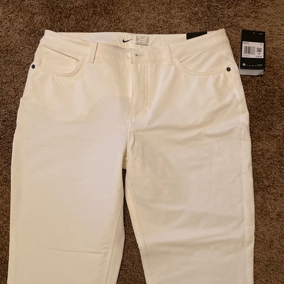 Nike Pants - NIKE WOMEN’S GOLF PANTS. WHITE. NWT. HAS STRETCH. 5 POCKETS. SIZE 10. CLASSY!